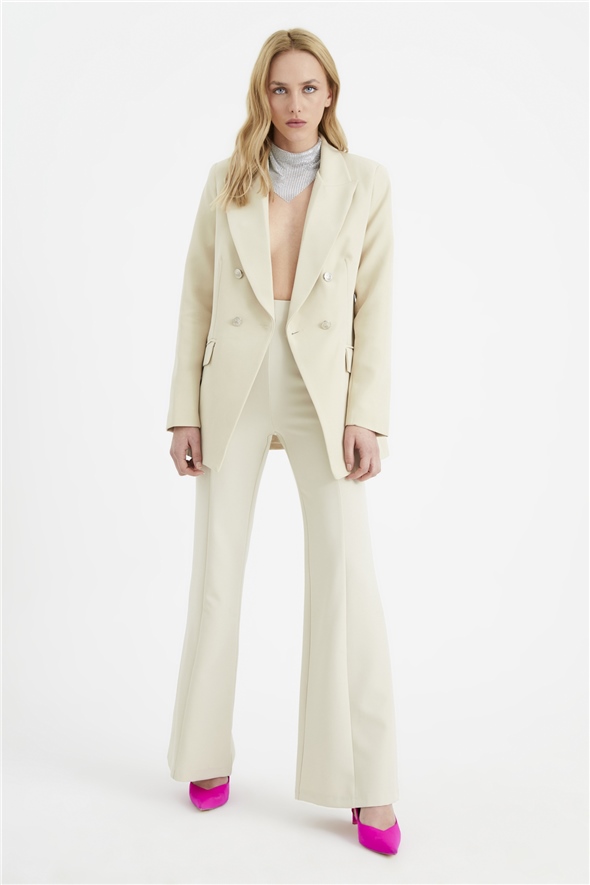 Wide trousers with button accessories - CREAM